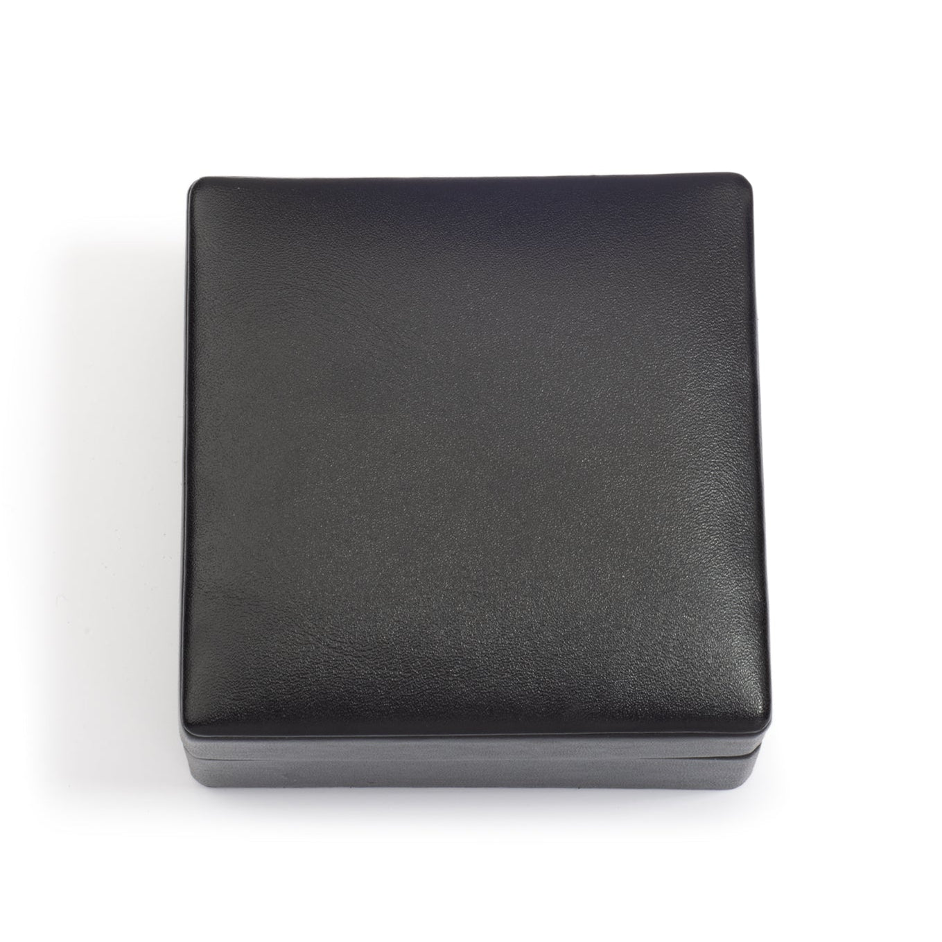A closed, square-shaped black jewellery box with a smooth finish, positioned against a white background.